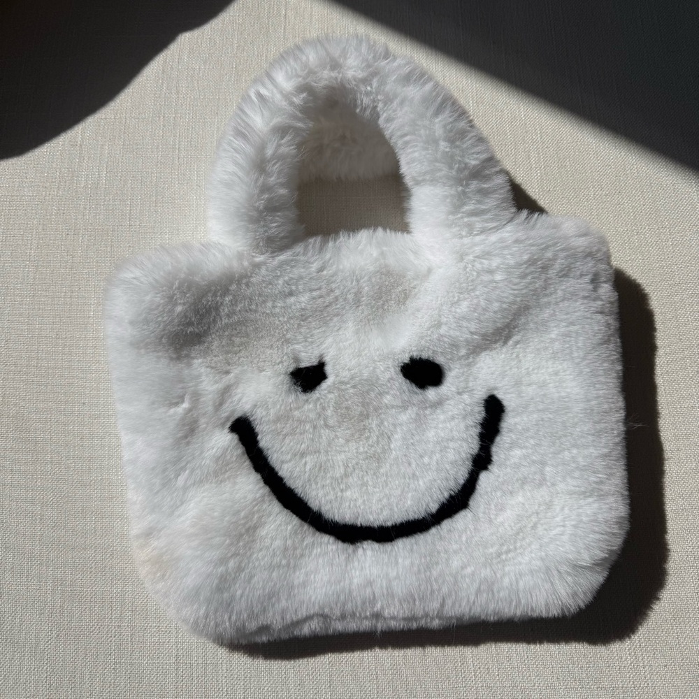 Fluffy White Smiley Face Bag
